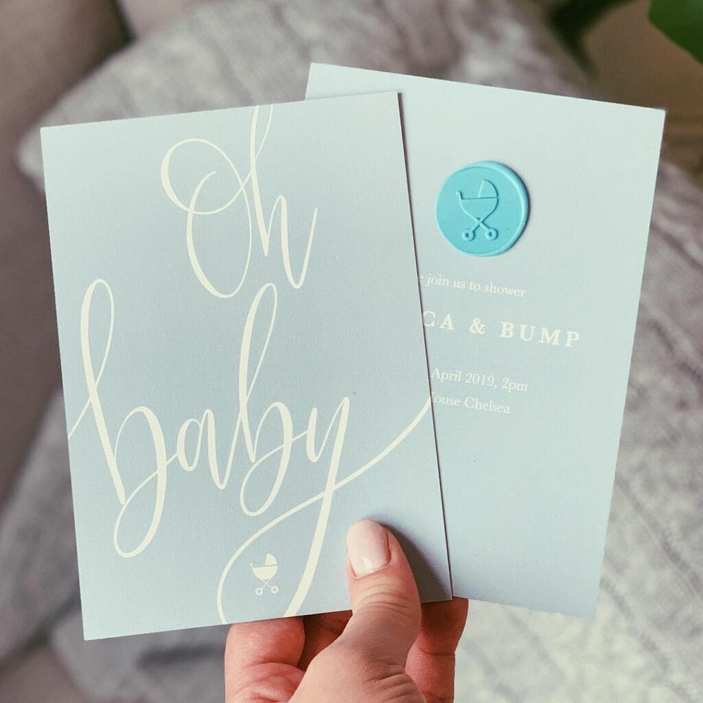 webbabyshower blue baby shower invite with stamp image from instagram
