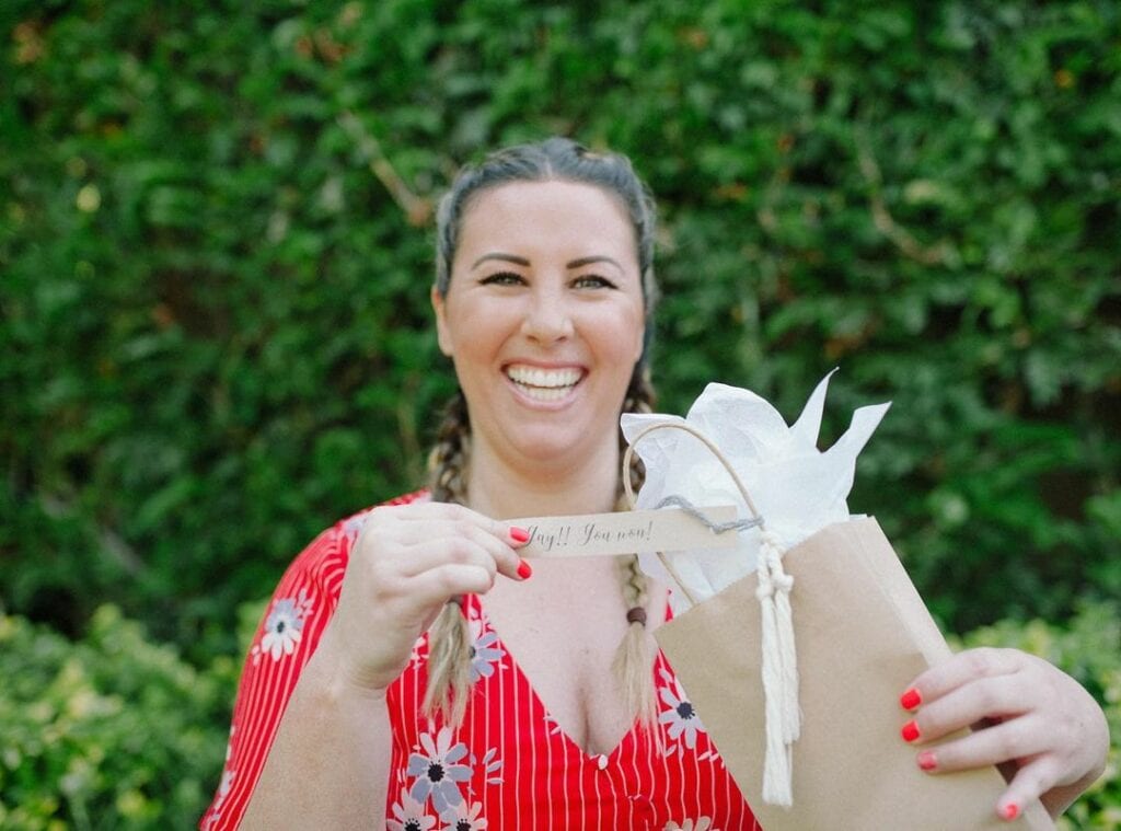 giving out baby shower prizes